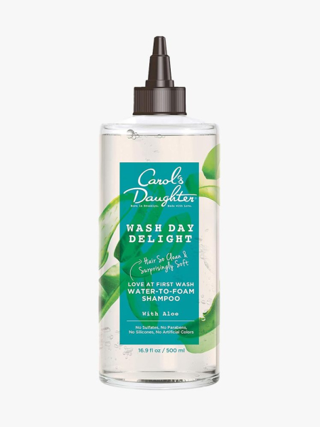Carol's Daughter Wash Day Delight Water-to-Foam Shampoo blue and transparent bottle with pointed black cap on light gray background