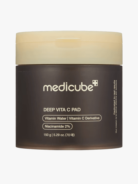 Medicube Deep Vita C Facial Toner Pads in branded tub component on a light gray background
